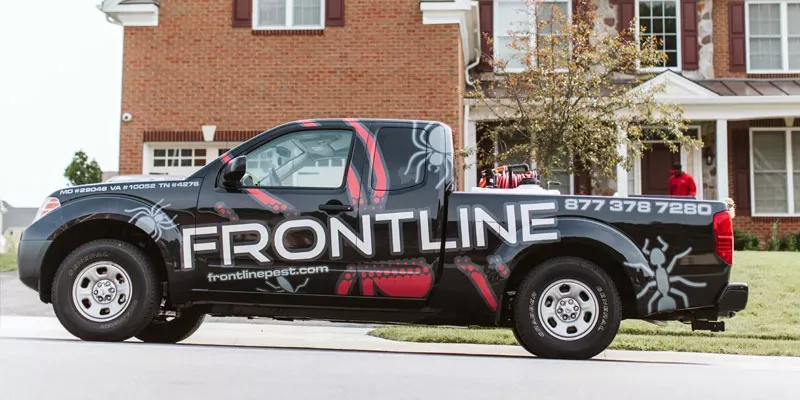 Frontline Pest truck outside home